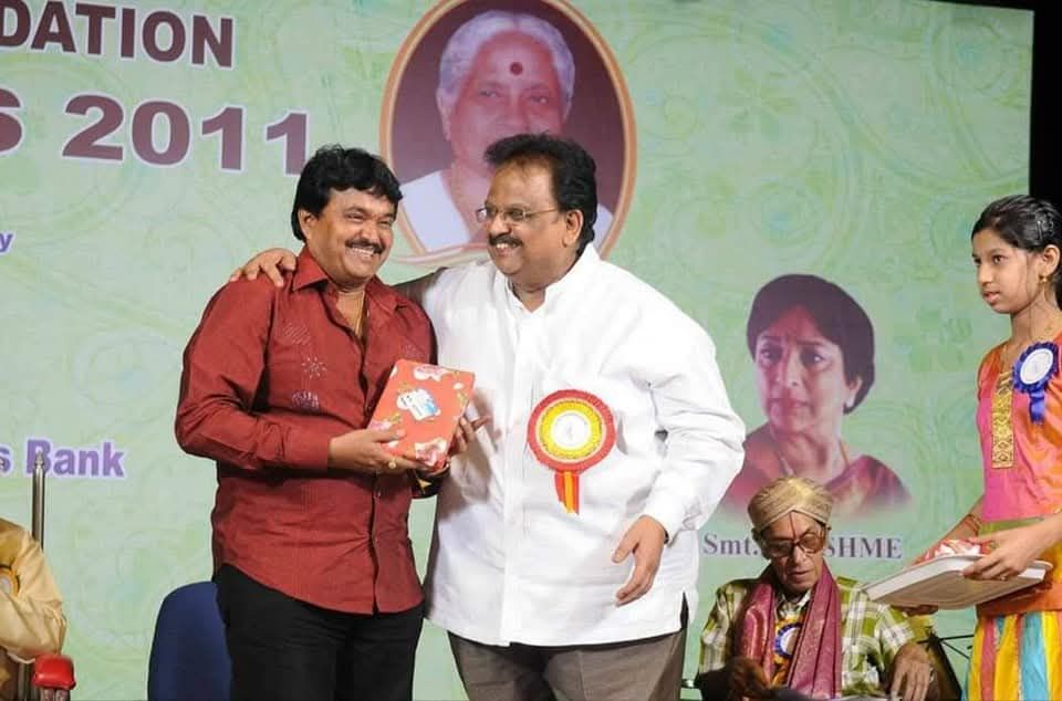 Ramu with a fellow artist at a 2011 award event
