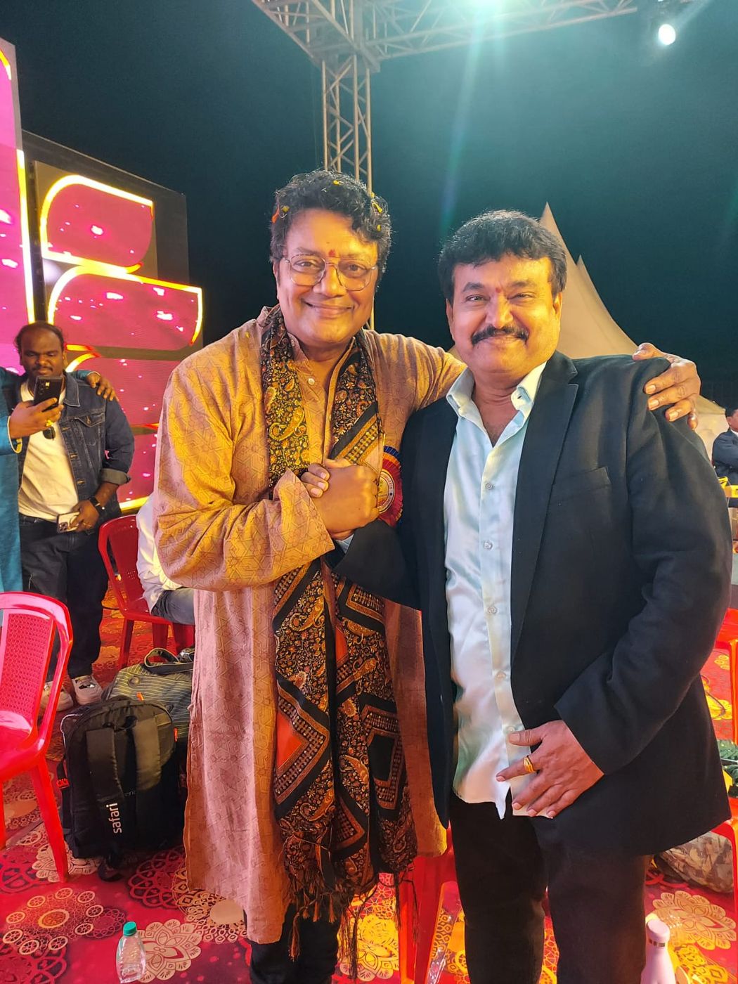Ramu backstage with a fellow artist